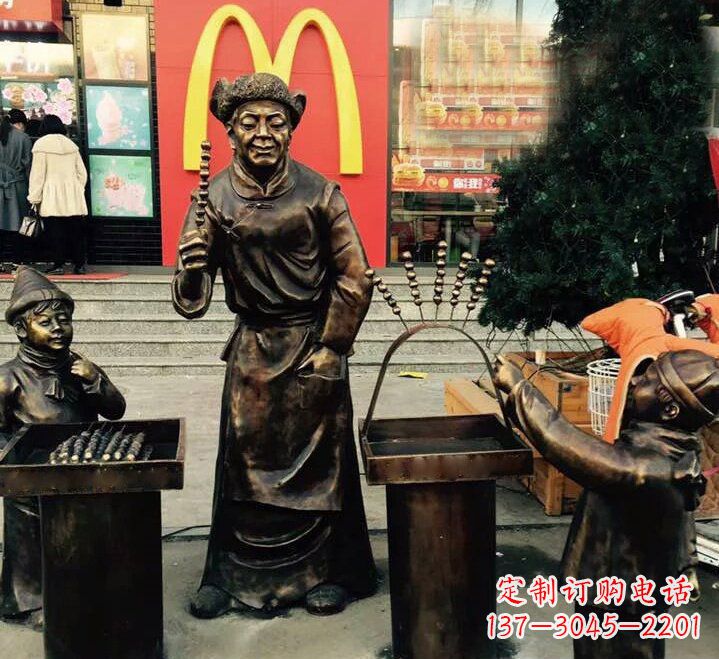许昌步行街卖糖葫芦的人物铜雕