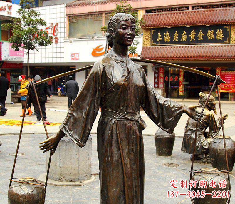 许昌挑着罐子的古代女人铜雕