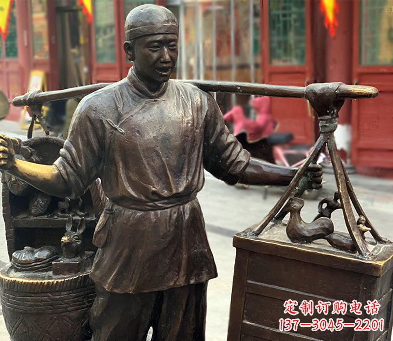许昌铜雕步行街卖货郎人物雕塑
